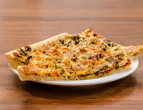 Pizza du moment + salade d’accompagnement